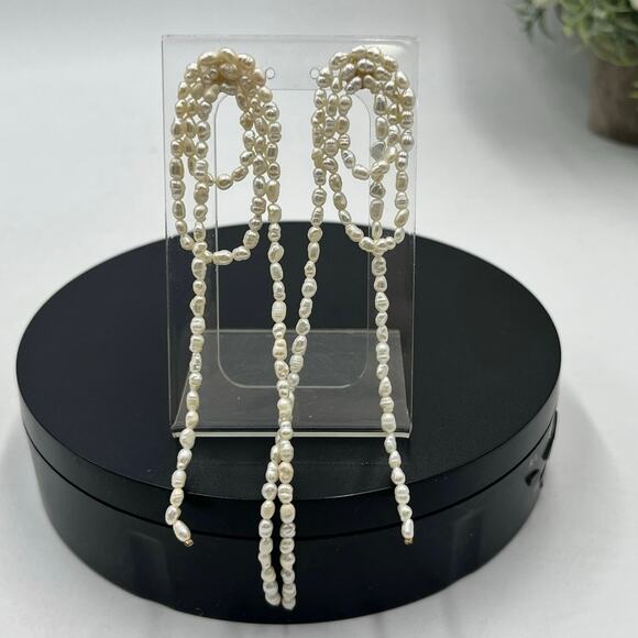 SHASHI Designer Women's Vroom White Rice Pearl Long Dangle Runway Earrings USA - Picture 1 of 8